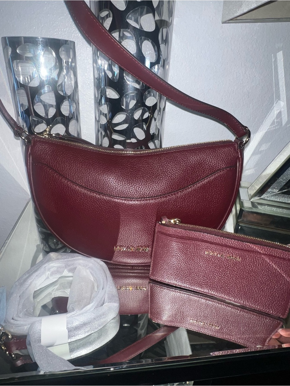 Michael Kors half moon Leather Shoulder Bag Oxblood w/matching wallet & strap.